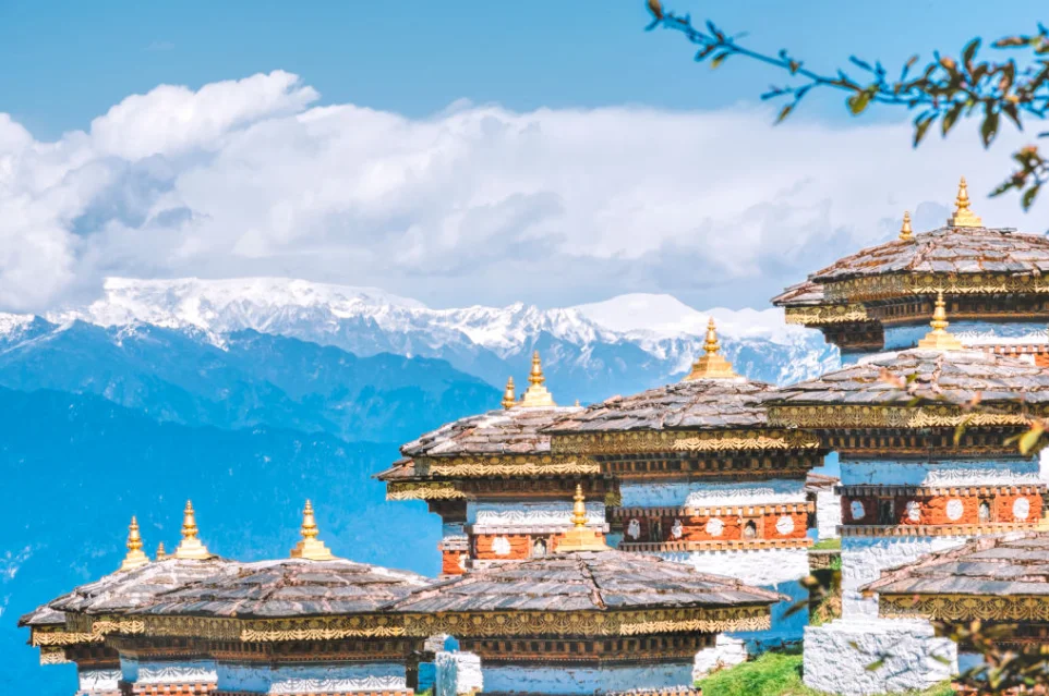 Tourists with licensed guide illustrating Bhutan's high-value low-volume tourism